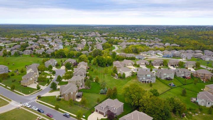 Aerial view of a leafy suburban neighborhood